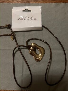 ettika Gold-tone Sculptural Pendant Necklace with Brown Cord